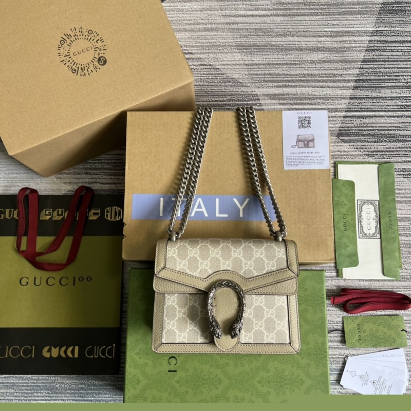 G*u*i top handle bags
